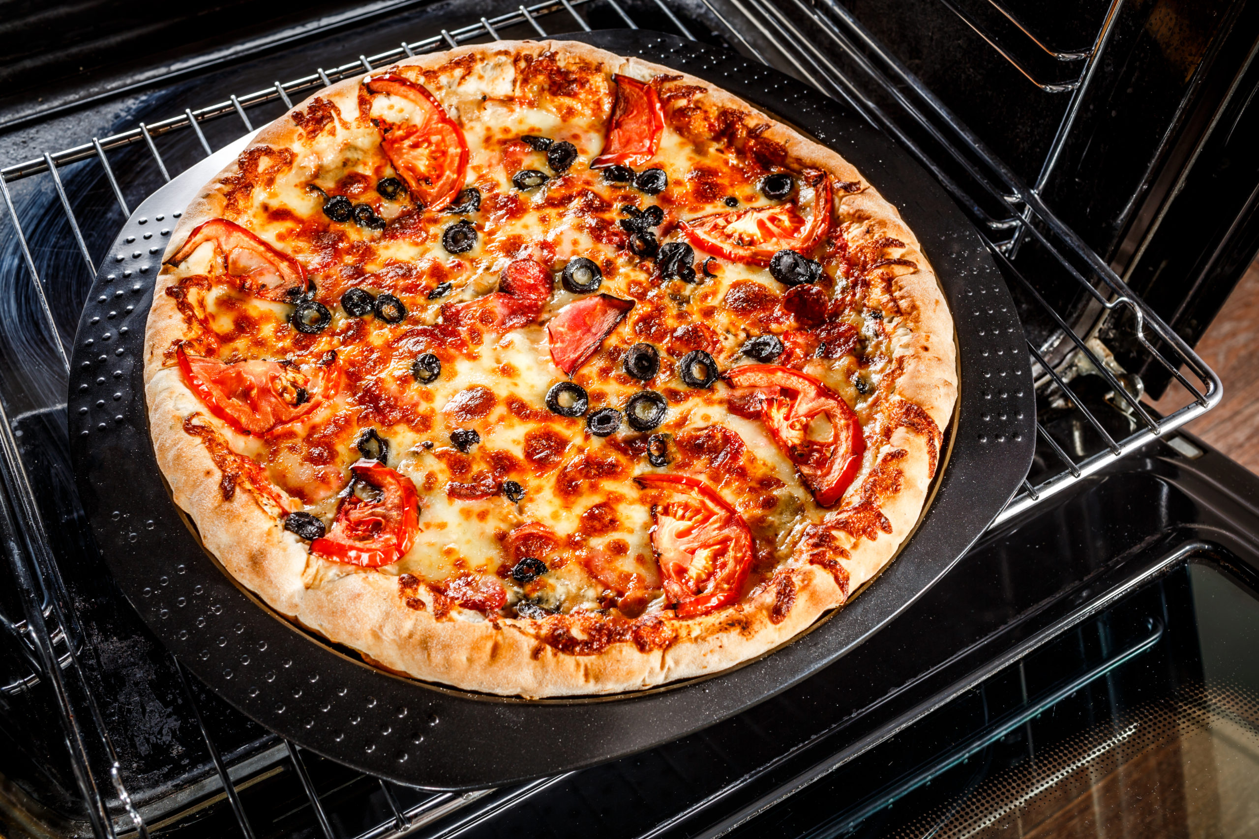 Appetizing Pizza In The Oven.